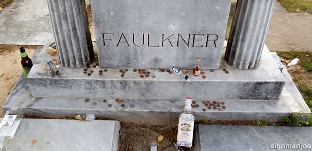 Offerings at Faulkner's grave.