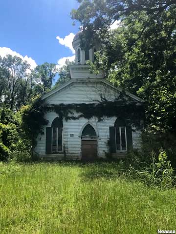 Boarded up church in not-a-ghost-town.
