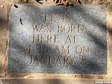 Ground plaque marker noting Elvis Presley birth time and date.
