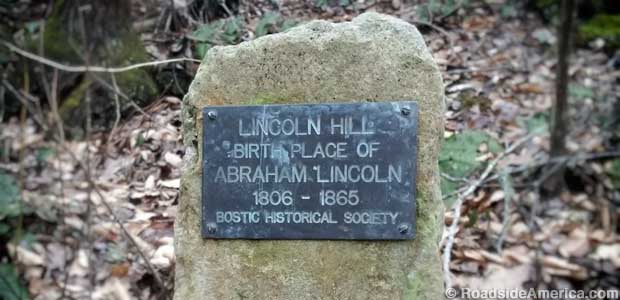 Plaque on a rock in the woods marks the supposed North Carolina birthplace of Abraham Lincoln.