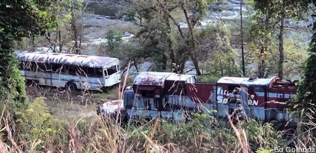 Fugitive bus and train wreckage.