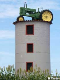 Tractor on a silo.