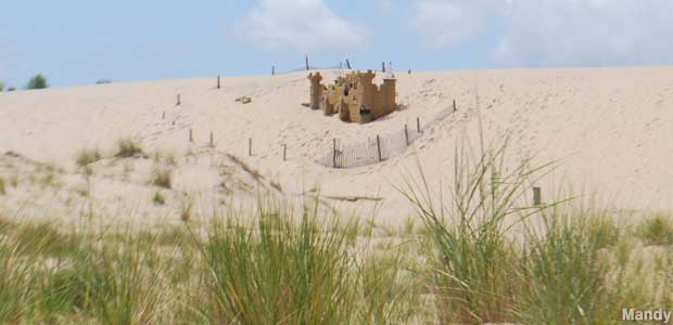 Deteriorating castle on the sand dune.