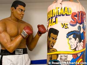 Muhammad Ali vs. Superman Punching Bag.
