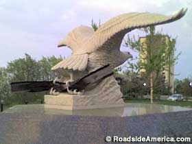 9-11 Memorial -- an eagle clutches a twisted steel beam.