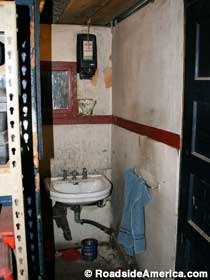 The repair shop bathroom.