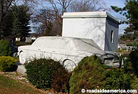 The Mercedes and the mausoleum.