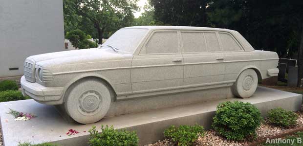 Granite tombstone shaped like a Mercedes Benz.