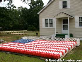 An American Flag made of plastic milk jugs.