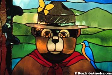 Smokey Bear stained glass.