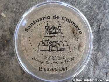 Gift shop sells empty dish for take-home Blessed Dirt.
