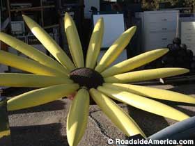 Sunflower made from bomb casings.