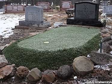 Golf green grave.
