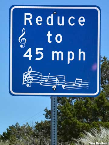 Speed reduction sign.