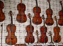 Wall of fiddles.