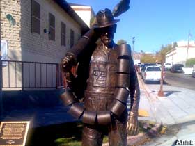 Outhouse cleaner statue.