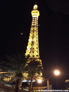 Eiffel Tower replica at night.