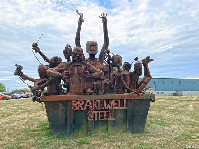 Brakewell Steel dumpster sculpture.