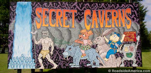 Secret Caverns billboard.