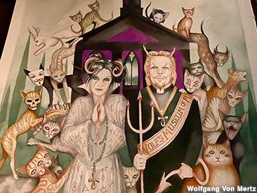 Ali, Wolfgang, and their cats: a watercolor by Dominic Murphy.