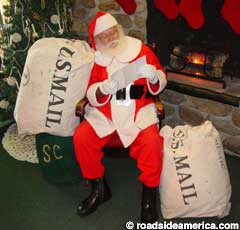 Santa reads mail.