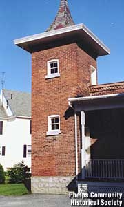2-story brick outhouse.