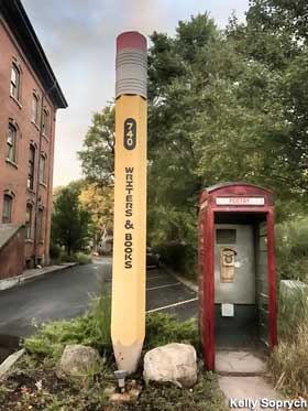 Pencil and phone booth.
