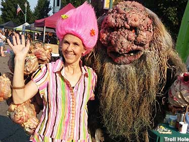 Troll Hole owner Sherry Groom and bearded troll friend.