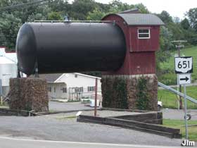 Storage tank resembling a train engine.