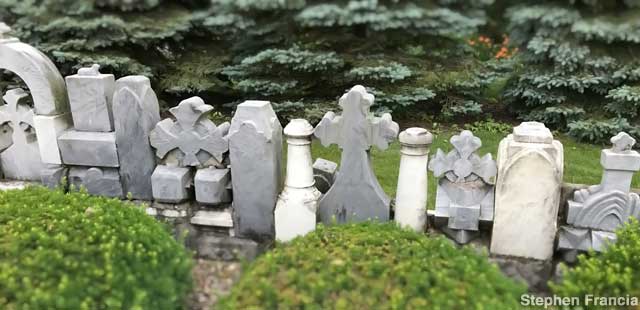 Wall of gravestones.