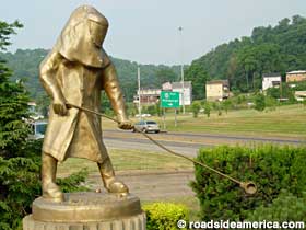 Steelworker statue.