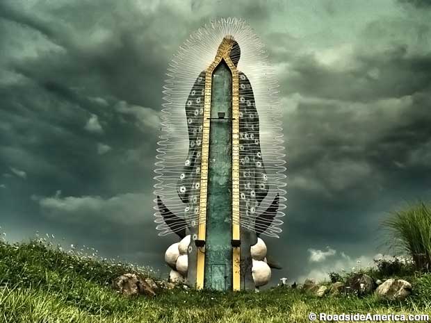 Our Lady of Guadalupe faces an oncoming storm with her metal nimbus.