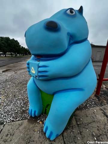 Blue hippo statue.