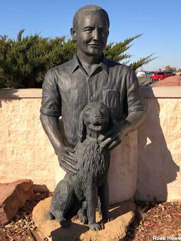 Sam Walton and Ol' Roy statue.