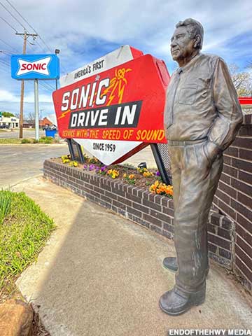 Sonic sign and statue.