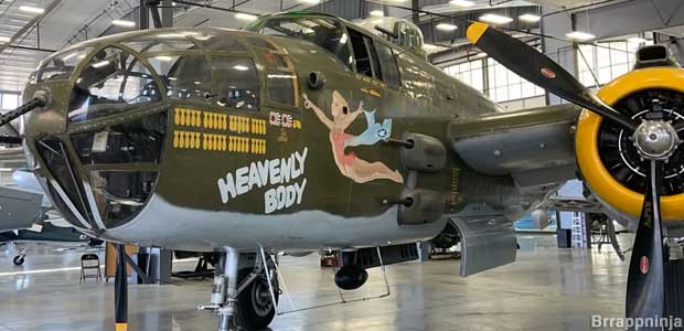 World War 2 American bomber painted with Heavenly Body nickname and tally of bombing missions.
