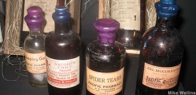 Potions for sale, and also bottled human souls in hay-lined boxes.