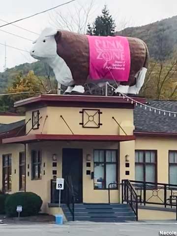 Steakhouse cow in pink.