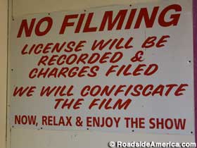 No Filming sign.