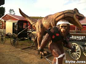 T-Rex pulls and Amish buggy.