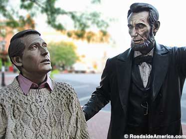 Abe can't take his eyes off of Perry's sweater.