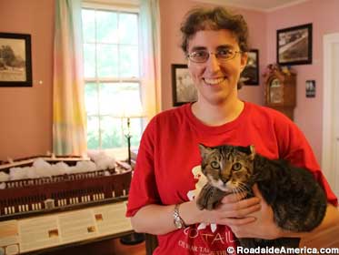 Rebecca Brown and Kitty, the only full-size cat at Civil War Tails.