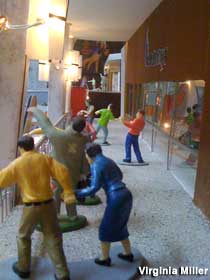 Miniature of zombies doing a little mall shambling.