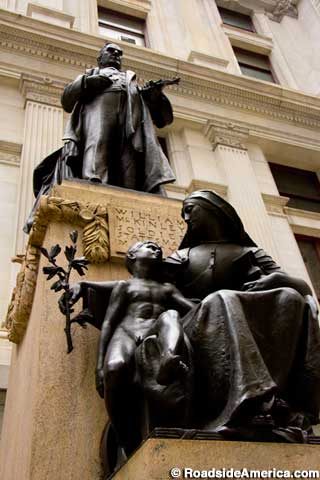 McKinley statue with allegorical figures.