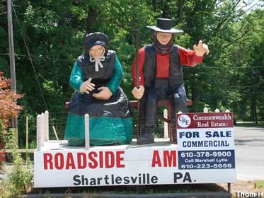 Friendly Amish couple statues, 2020.