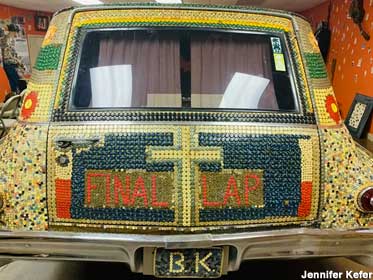Hearse with Final Lap button mosaic.