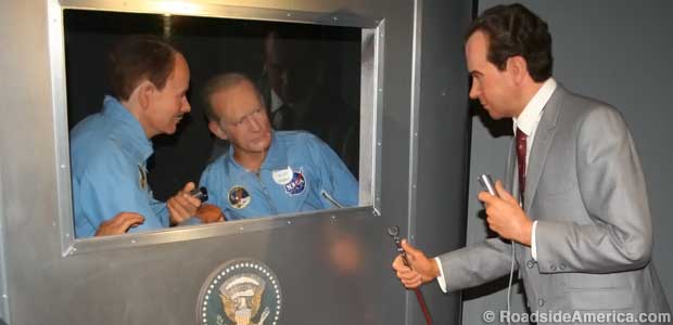 Wax Nixon greets wax astronauts.