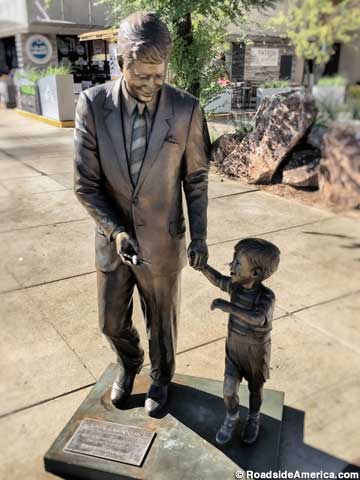 John F. Kennedy and son statue.