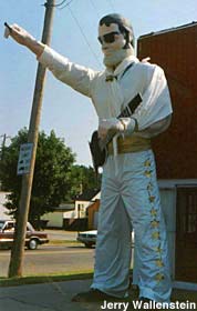 Elvis Presley imitating Muffler Man.