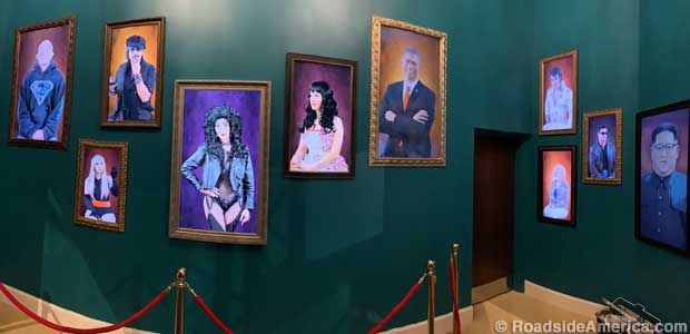 Portraits of celebrity impersonators come to life as you walk past.